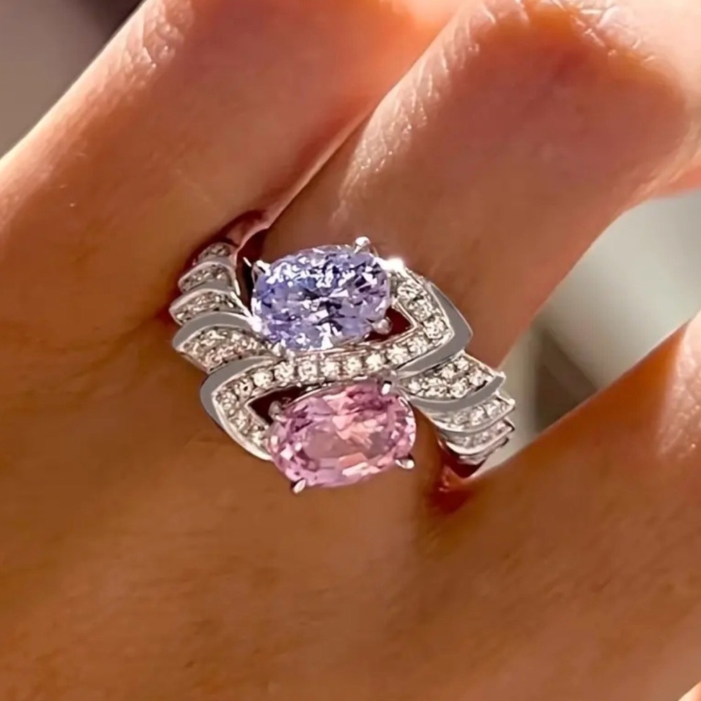 Elegant Silver Ring with Pink and Purple Gemstones.